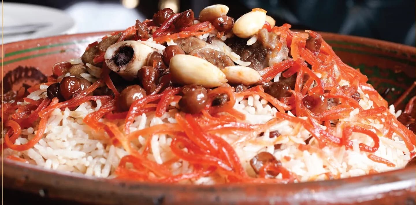 Ghani Shinwari pulao with meat, carrots, raisins, and nuts