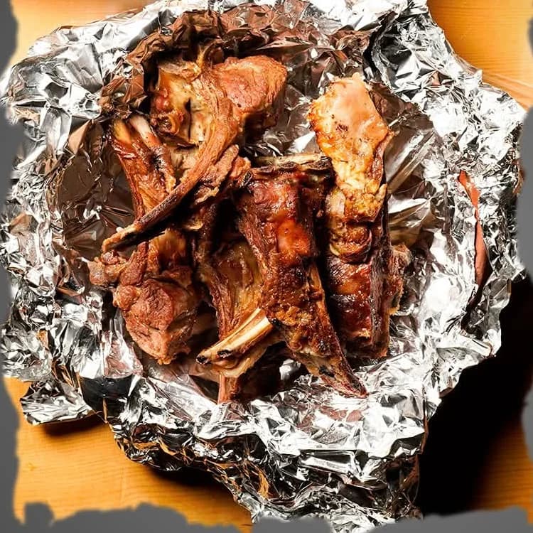 Namkeen Champ Tikka served on foil