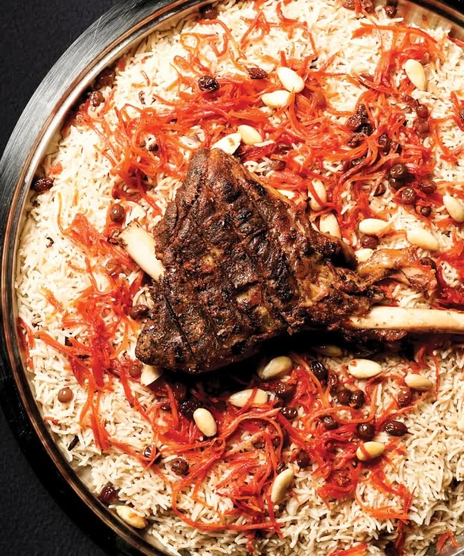 Ghani Shinwari raan served over a platter of rice